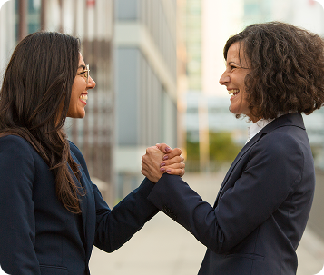 Simple solutions - Professional women shaking hands